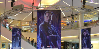 Mall with Avengers: Endgame banners featuring Hawkeye.