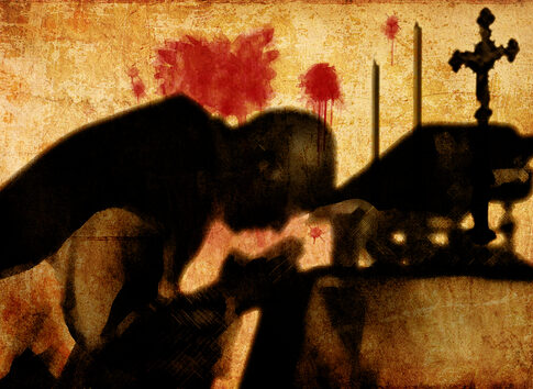 Silhouette of person praying near altar with cross.