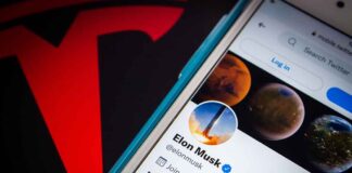 Twitter profile page on a smartphone screen.