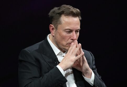 Man in suit deep in thought.
