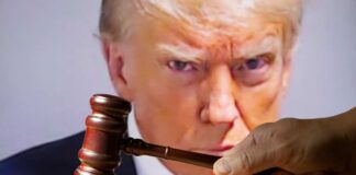 Gavel in foreground, Donald Trump in background, serious expression.
