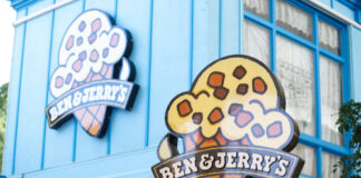 Ben & Jerry's ice cream shop with logo signs.
