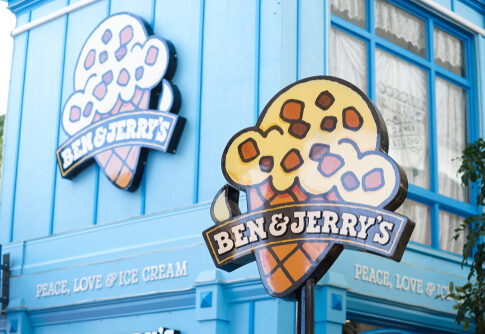 Ben & Jerry's ice cream shop with logo signs.