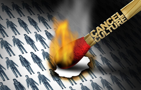 Burning match labeled Cancel Culture, igniting paper people.