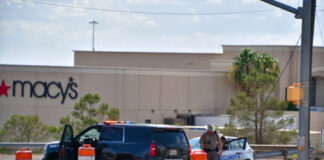 Police and security at roadblock near Macy's store.