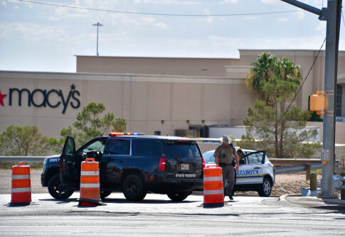 Police and security at roadblock near Macy's store.