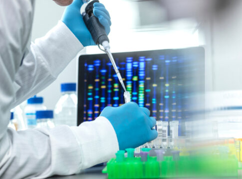 Scientist conducting a DNA test in a laboratory.