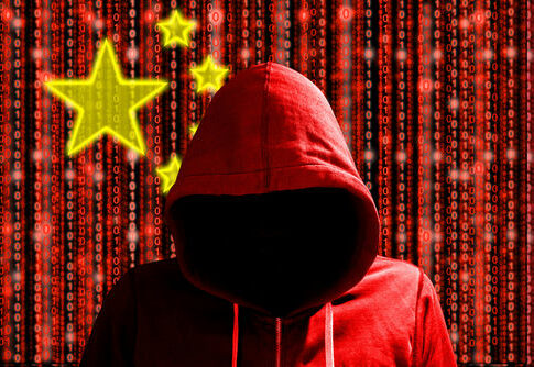 A hooded figure in a red hoodie against a backdrop of binary code and stars representing China