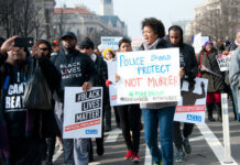 BLM Bombshell: Donor Cash Went Political? Protesters holding signs, including Police Should Protect Not Murder.