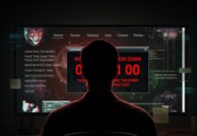 Cyber WARFARE Shake-Up Looms — Pentagon ON EDGE… A person sitting in front of a computer screen displaying warning messages and code