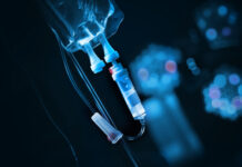 Dead Donor Rule Under Fire Close-up of an IV drip setup with a blue background